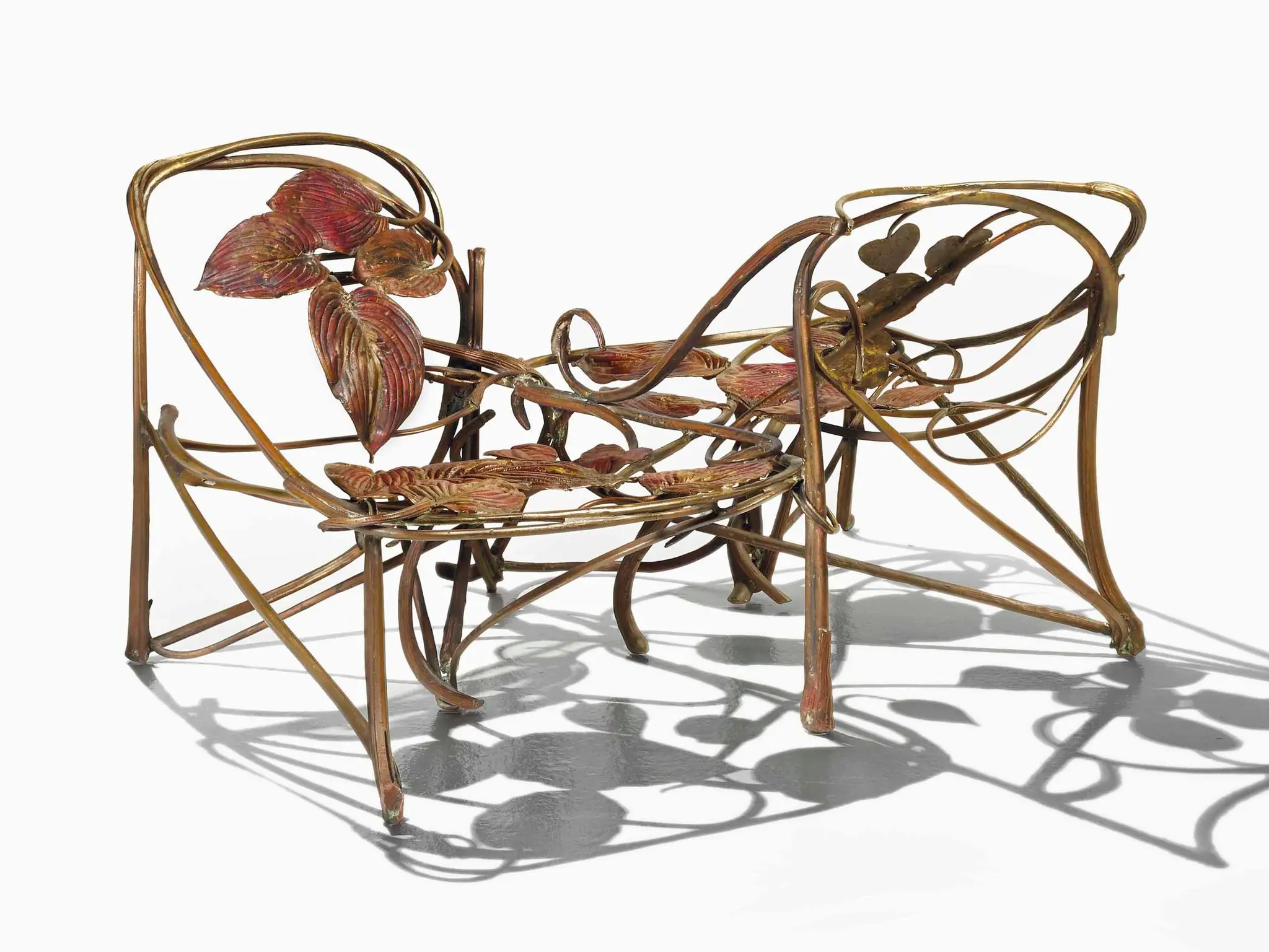 "Love Seat", 1972, da Sra. Lalanne, feito de bronze dourado e cobre galvanizado.Crédito...Les Lalanne/Artists Rights Society (ARS), Nova York/ADAGP, Paris, via Christies Images Ltd.