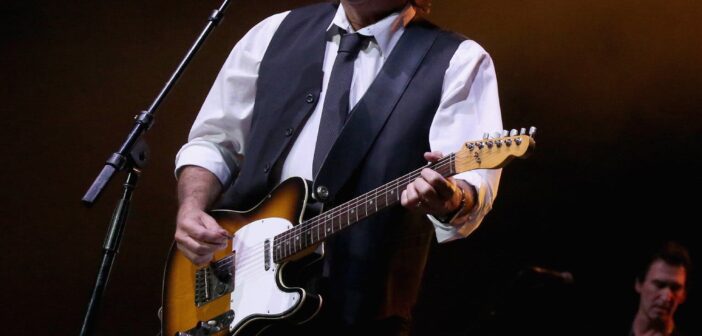 Greg Kihn se apresentando em um show em Cedar Park, Texas, em 2018.Crédito...Gary Miller/Getty Images