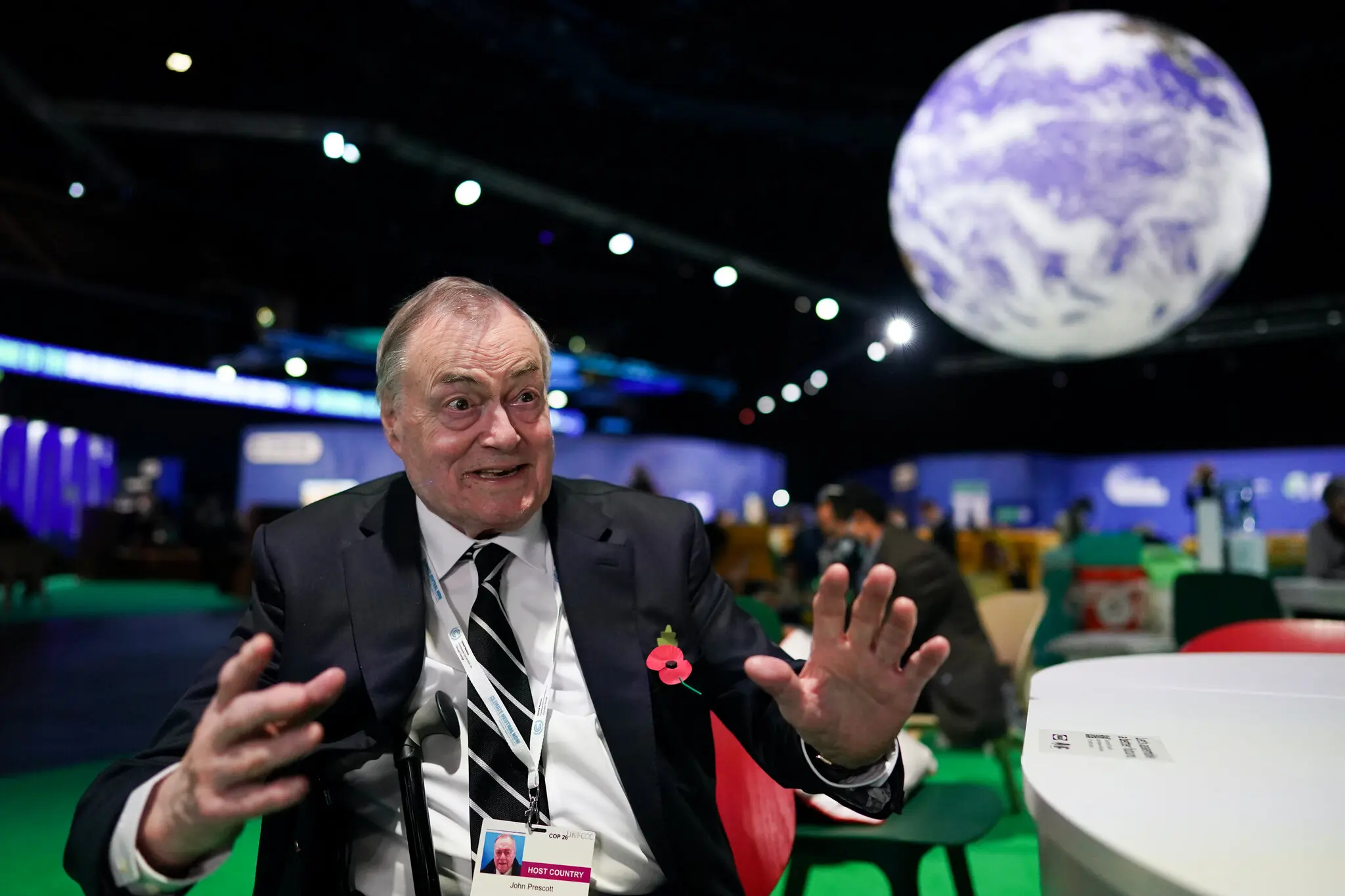 Sr. Prescott na reunião da COP26 em Glasgow em 2021. As questões ambientais desempenharam um papel importante em sua carreira política.Crédito...Ian Forsyth/Getty Images