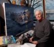 Mort Künstler em 2011 com sua versão de “Washington Crossing the Delaware” em seu estúdio em Cove Neck, NY, em Long Island. Suas pinturas históricas bem pesquisadas às vezes desafiavam obras mais conhecidas.Crédito...Michael Nagle para o The New York Times